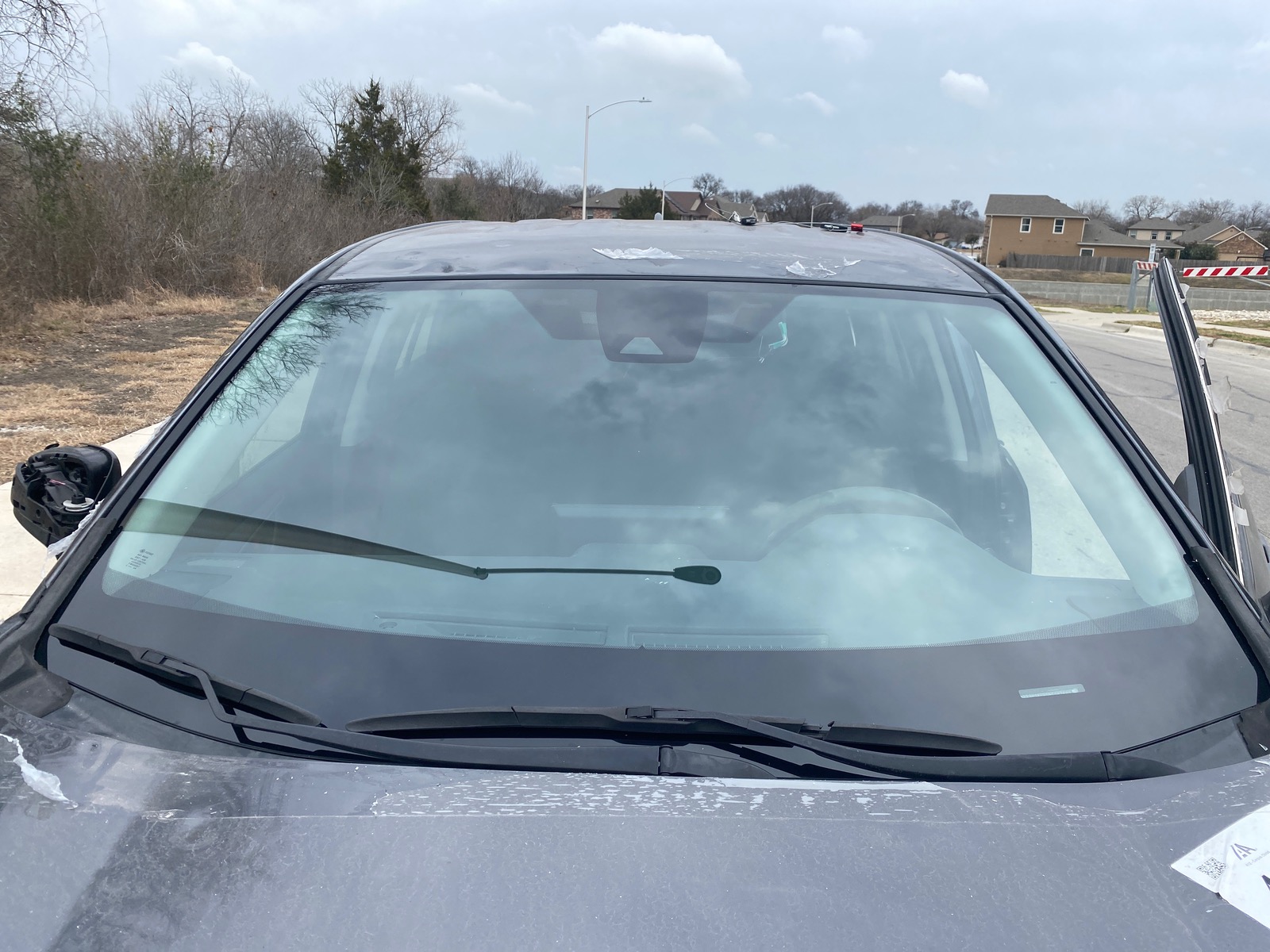 Windshield before and after replacement — after